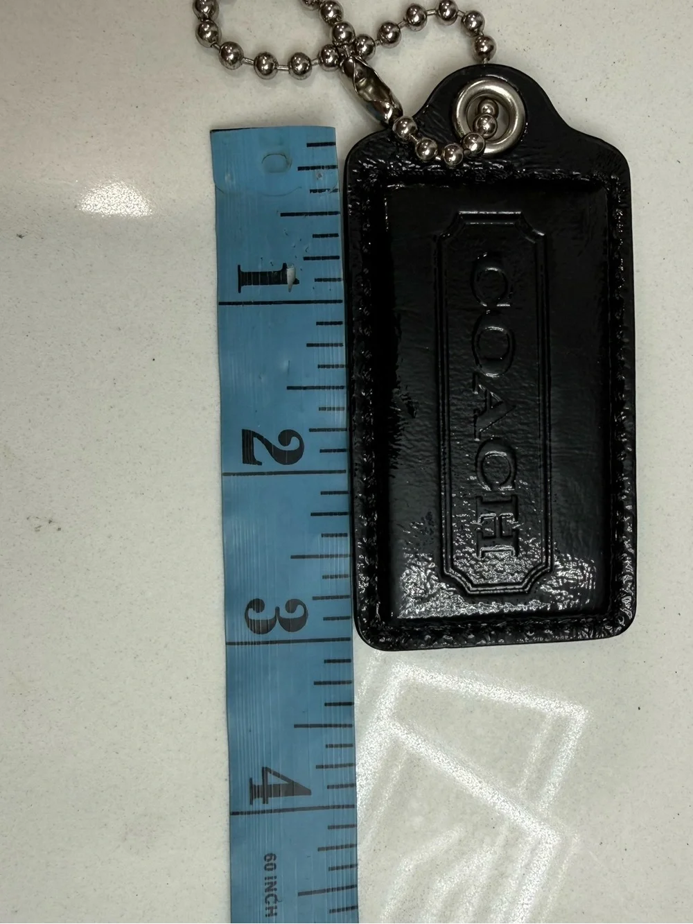 Coach key tag